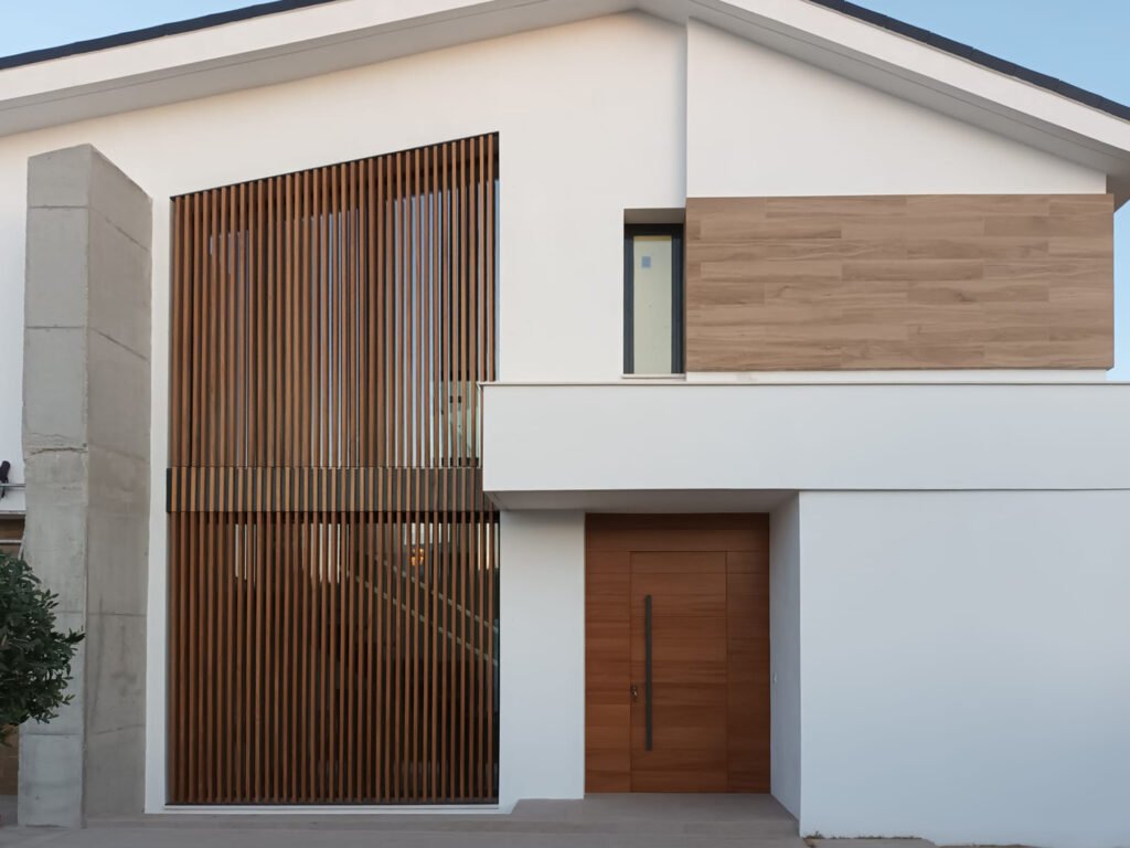 Imagen de una casa donde se ven las puertas y ventanas.